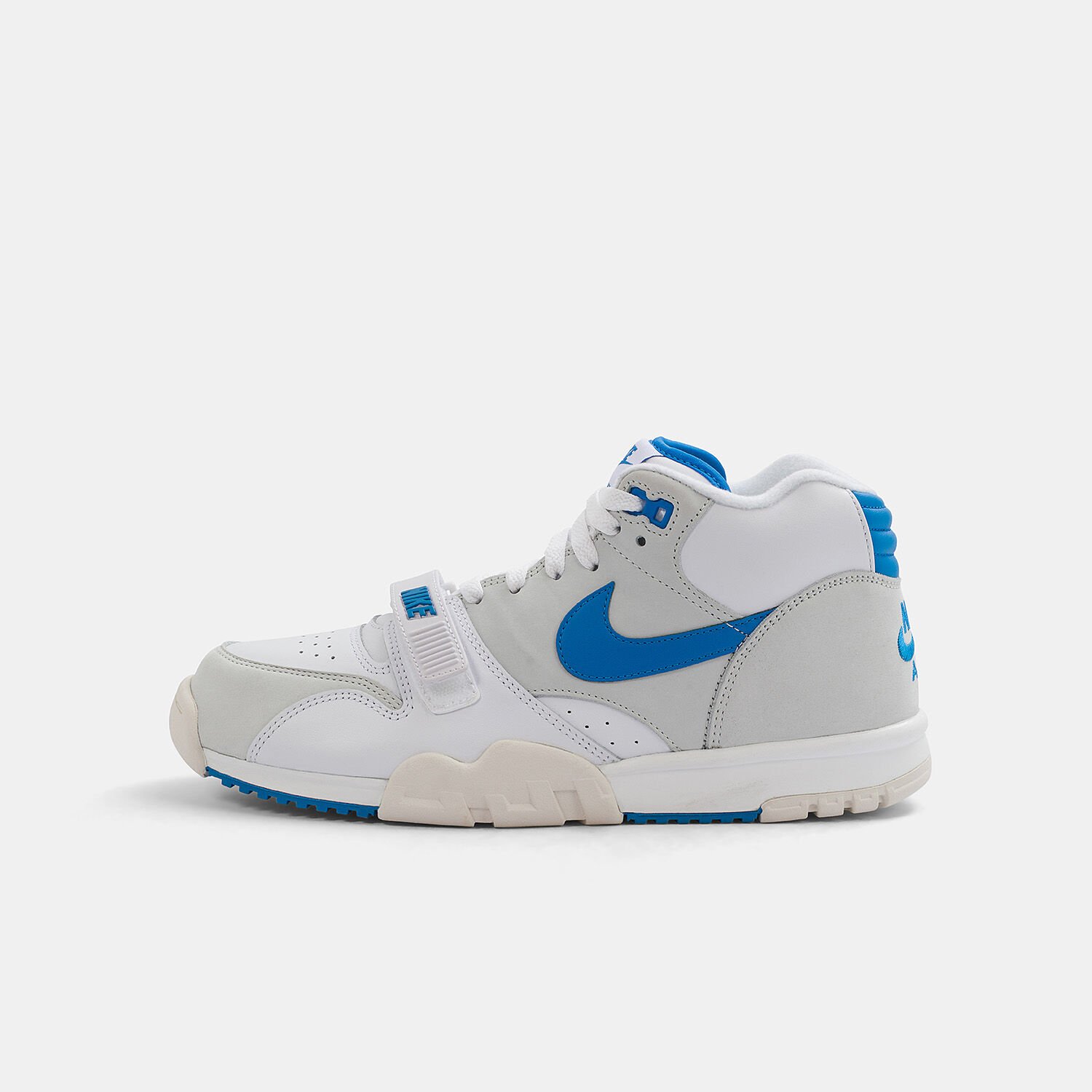Nike white and blue trainers 2025