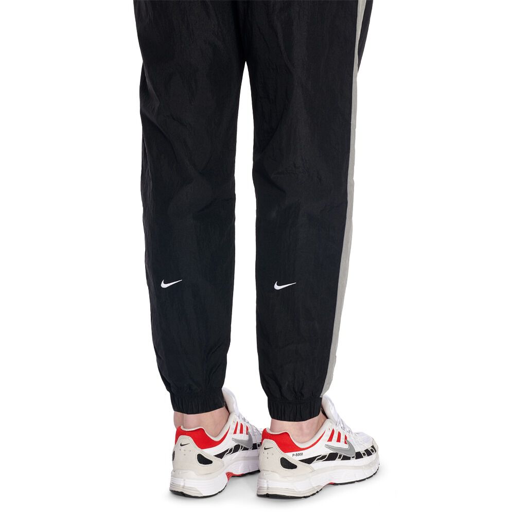 Nike swoosh track pant deals