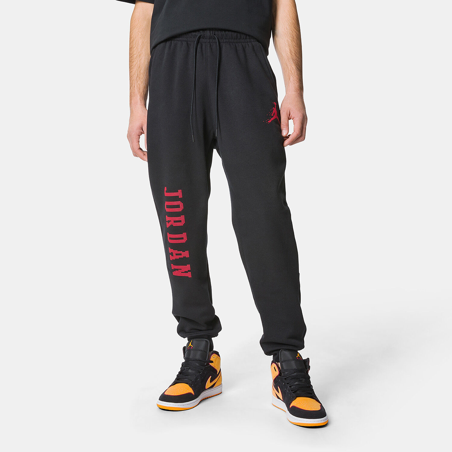 Pantaloni Jordan Essentials Holiday neri e rossi AW LAB