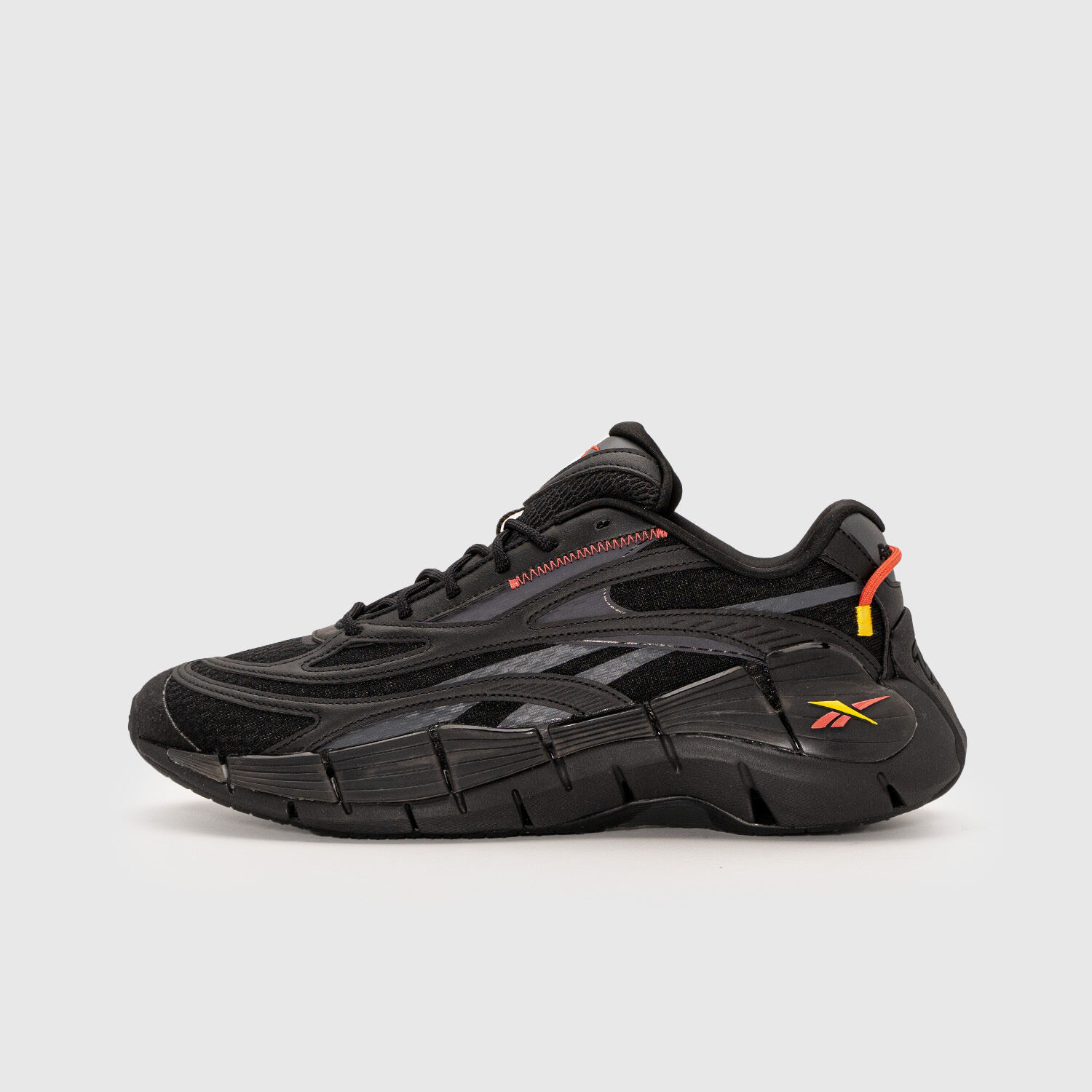 Black and cheap orange reebok