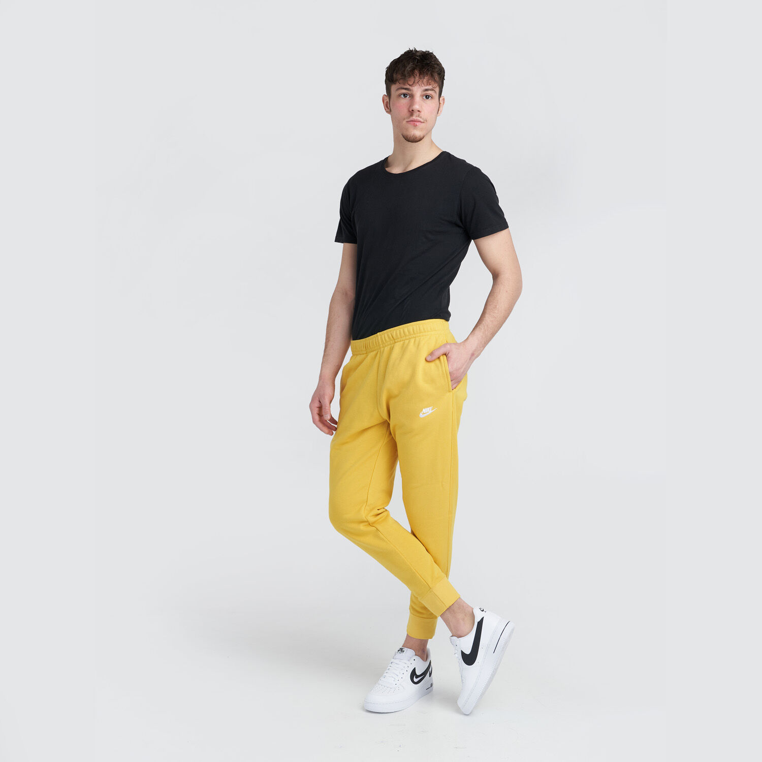 Yellow nike pants top