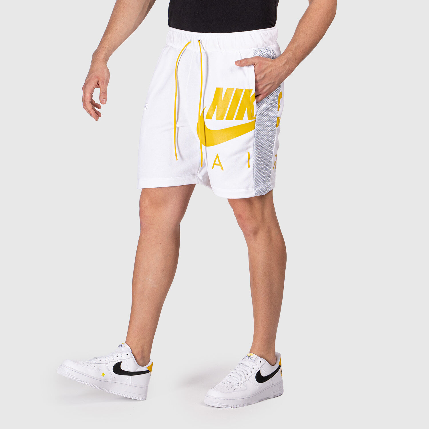Yellow and white nike new arrivals shorts