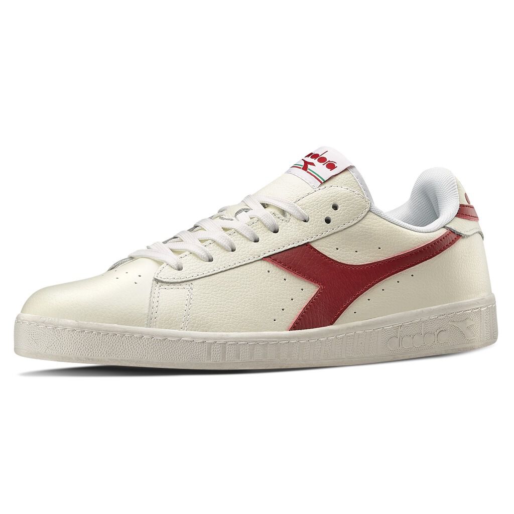 white full grain leather upper with waxing. Rubber outsole with