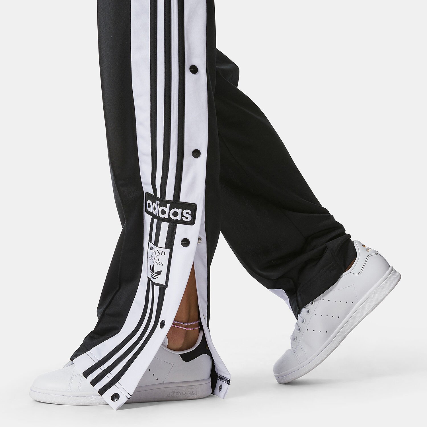 Adidas store trainer bottoni