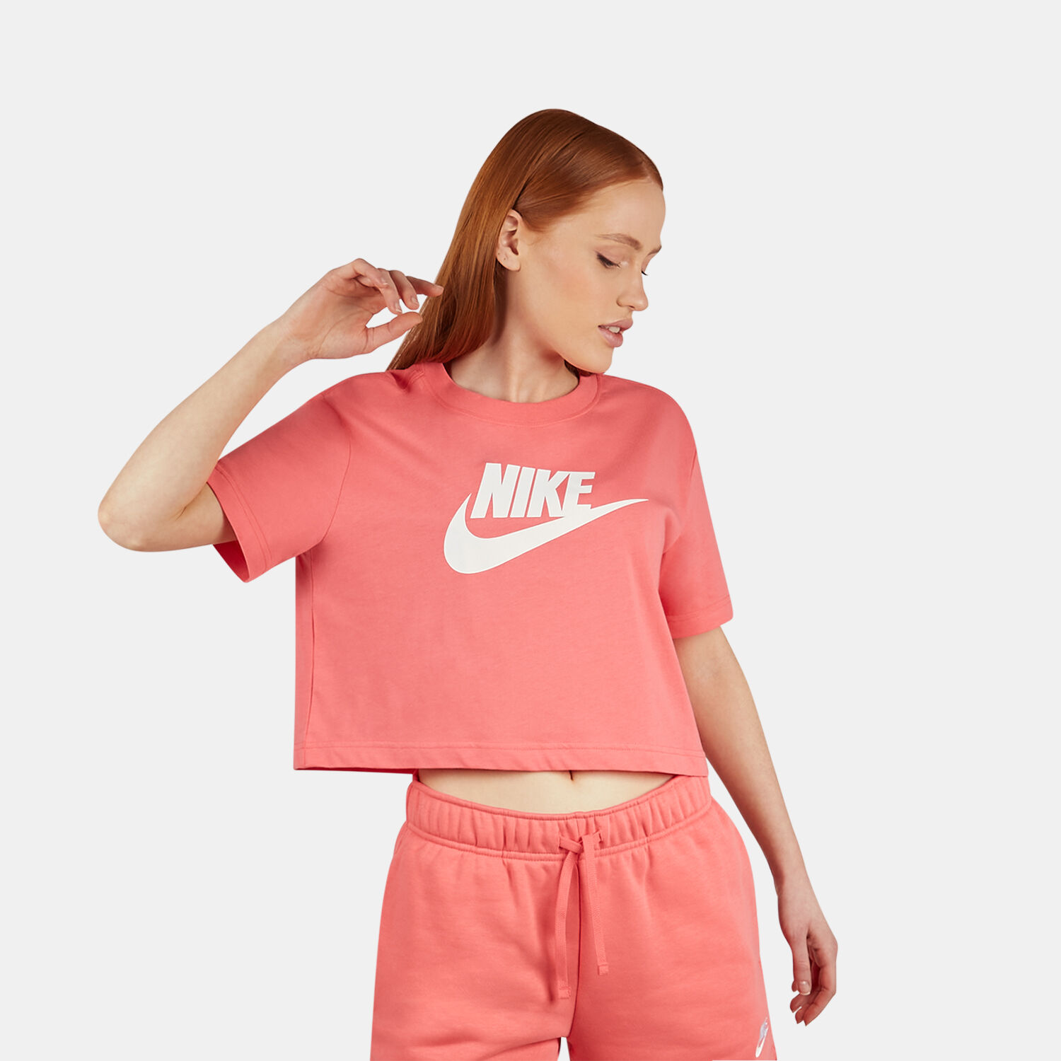 Pink and white deals nike shirt