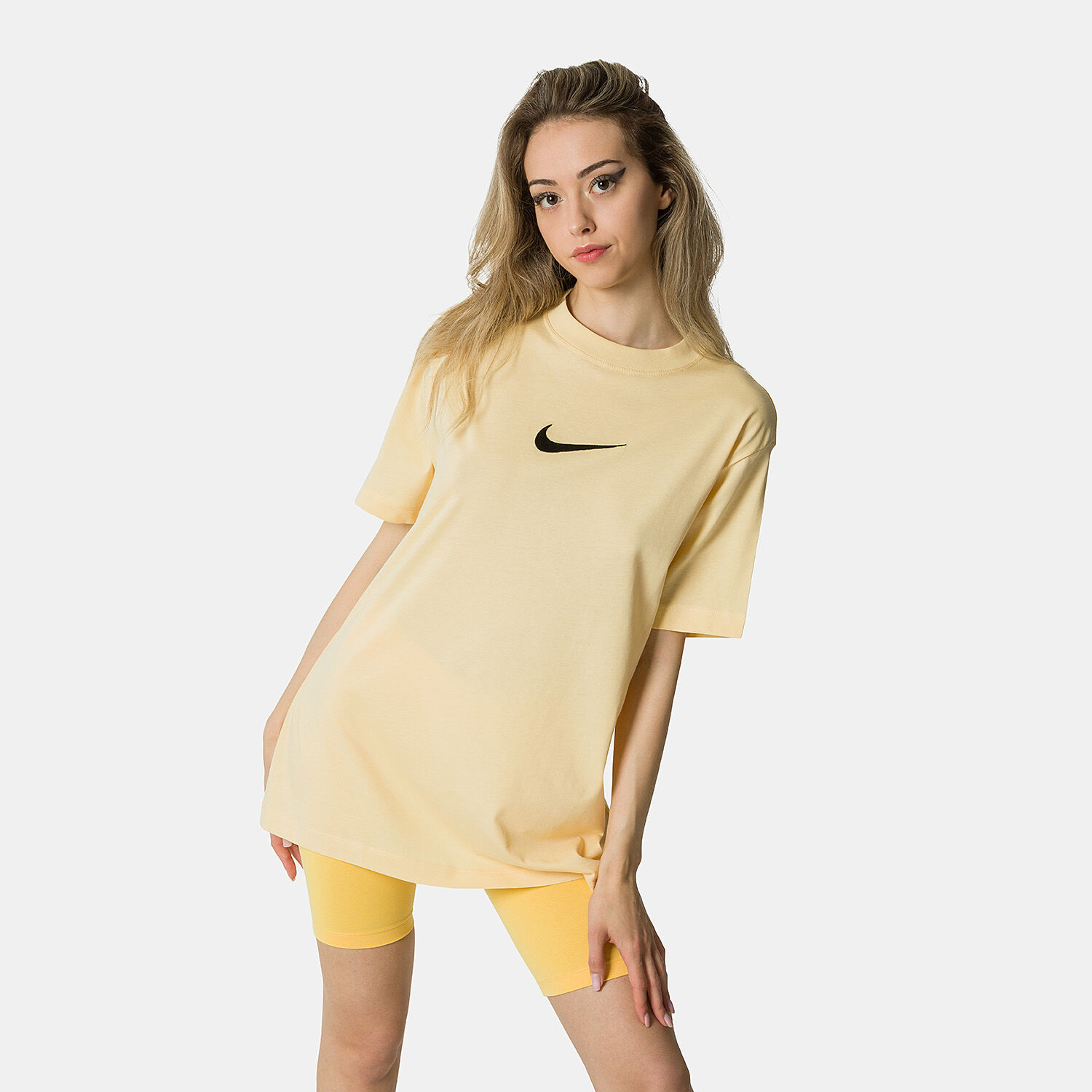 Black nike shirt top with yellow swoosh